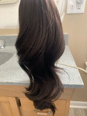 Dark Brown Women’s clip on ponytail- Natural Shine. Never used.